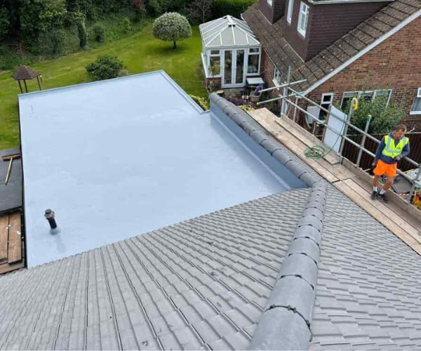 This is a photo of a newly installed hip roof, with a combined liquid covered flat roof. Work carried out by JYT Roofing Hitchin